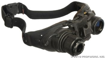 Atlantis Night Vision. These are built on the wrap around Peppers goggles that were sometimes used in SG1. The lenses were removed, and the fake night vision parts added. Those parts are what we need to ID! Bunches of other photos HERE: http://sg1props.com/forums/viewtopic.php?f=2&amp;t=514